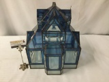 Stained glass style acrylic house sculpture. Measures approx 17x13x13 inches. MB