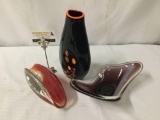 Collection of three art glass pieces. Signed 2012 black glass vase, signed clam shell dish, and