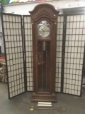 Elegant vintage Ridgeway Tempus Fugit grandfather clock w/pendulum, key, and three weights.