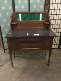 Antique marble top wash stand with tile backsplash. One of the towel holders is broken. Measures
