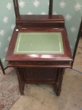 Vintage secretary cabinet with carved wood accents. Measures approx 35x21x23 inches. MB