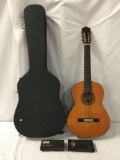 Yamaha CG-100 nylon string classical guitar with hard case and Korg At-12 tuner. Case measures