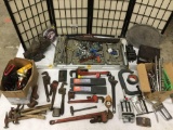 Large lot of hammers, clamps, staple guns (w/staples), wrenchs, sockets, ratchets, a machete, tool