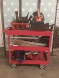 Three tray red service cast full of hand tools, electric planer, dirt devil and more. Cart measures