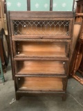 Antique Lundstrom sectional bookshelf lawyers cabinet. Measures approx 57x34x12 inches. MB
