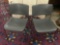 Pair of grey United Chair stacking metal/plastic chairs, approx 19x29x22