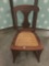 Vintage rattan seat child?s rocking chair.
