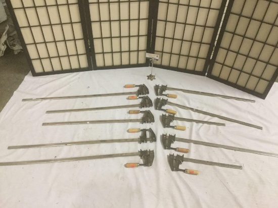 Ten Pittsburgh clamps of varying lengths, approx. 34x5x5 inches.