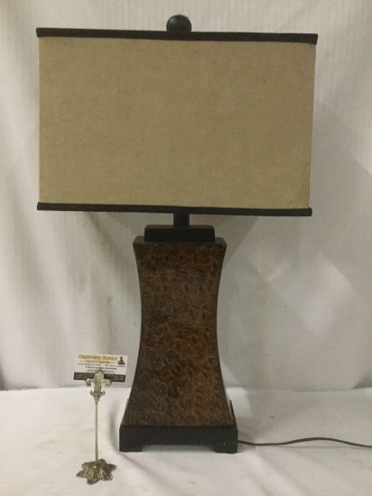 Modern brown lamp with tan shade, tested and working fine, approx. 18x10x32 inches.