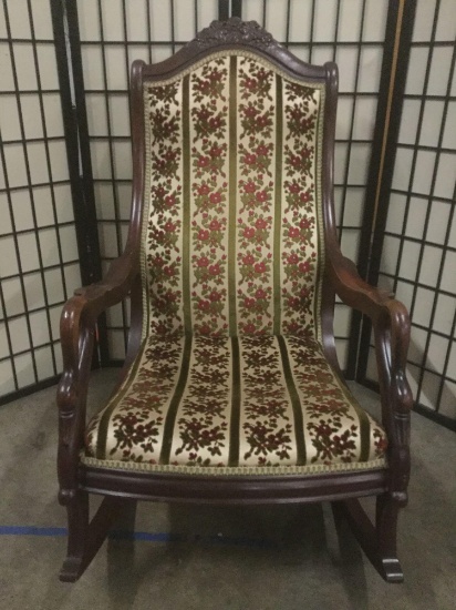 Vintage goose armed rocking chair w/floral upholstery, approx.26x36x43 inches.