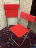 Pair of red IKEA - Jeff folding chairs, approx 20x31x17 inches opened.