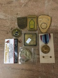 Collection of 7 US military awards. The largest measures approx 3x2 inches.