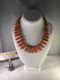 Orange marble cut stone pendant necklace, approx 18 inches