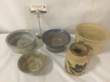 Five pieces of assorted stoneware pottery.