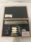 Winchester rifle cleaning set in wood case.