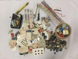 Large lot of vintage and modern buttons, thread, and knitting needles.