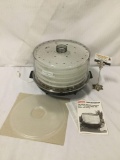 Waring food dehydrator with manuals and original box.