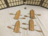 Four wooden 10 inch clamps, approx. 11x16x2 inches.