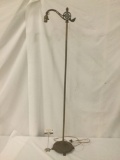 Antique metal floor lamp, tested and working, approx. 12x10x56 inches.