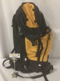 Yellow & black DaKine Frontier backpack w/waist strap, approx. 27x15x5 inches.