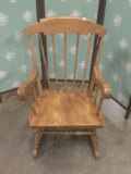 Vintage oak child?s rocking chair.