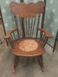 Antique 1800s upholstered seat oak spindle rocking chair.