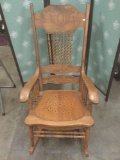Rare antique quad press rocking chair with barley twist spindles.