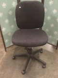 Office Depot Black swiveling office chair.