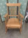 Antique circa 1900 oak rocking chair.