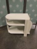 Vintage repainted magazine rack.