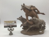 1988 Provincial ceramic piece depicting a man running with wolves.