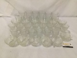 Collection of 38 matching glass cups, tumblers, and stemware.