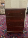 Vintage wood dresser with 4 drawers, missing one drawer pull, approx 30x17x45 inches.