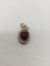 Vintage 14k gold pendant with amethyst stone.