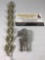 2 piece jewelry lot; silver tone giraffe pin broach and butterfly design bracelet approx 7.5 x 1