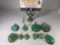 Lot of 5 green tone polished agate necklace pendants , 1 with chain, 1 pin and 2 sets of earrings