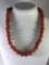 Coral beaded necklace, made in India, approx 21 inches
