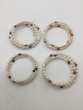 Four pearl and stone bracelets.