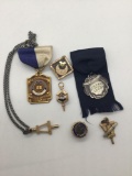 Collection of 7 vintage and antique commemorative pins. Fraternity and more.