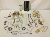 Approx. 40 pieces of estate jewelry, incl. bracelets, necklaces, & more. Approx. 16x13x2 inches.