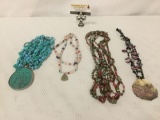 Four estate jewelry stone & bead necklaces, one of which has a sterling silver clasp.