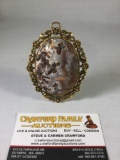Gold tone polished agate frame standing pendant approx 3 x 3.5 inches
