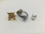 Estate ring, pin, and pendant.