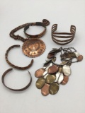 Collection of 6 copper and brass bracelets and necklaces.
