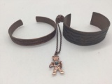 Two copper bracelets and copper and turquoise necklace.