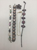 Collection of 5 pieces of vintage and modern bracelets and brooch.