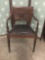 Italian ridge back chair with leather seat. Measures approx 34x21x17 inches.
