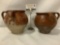 Pair of antique two-handled ceramic vases w/earth tones. Some small chipping. Approx. 7.5x7.5x6.5 in