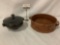 An antique stoneware vessel & a vintage dark ceramic lidded bowl, both with handles.