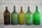 Lot of 5 large vintage green glass bottles, unmarked, approx 5 gallons / 25x9 inches.